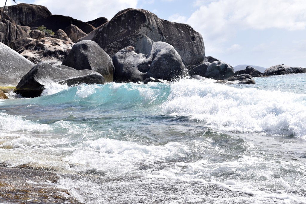 Dinghies are not allowed onshore, so you hook onto a mooring and swim ashore. WE MADE IT through this surf!